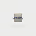 Two half signet rings and one half-eternity band. 11 iolites.