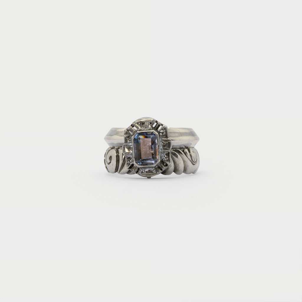 Two found rings and a single earring.