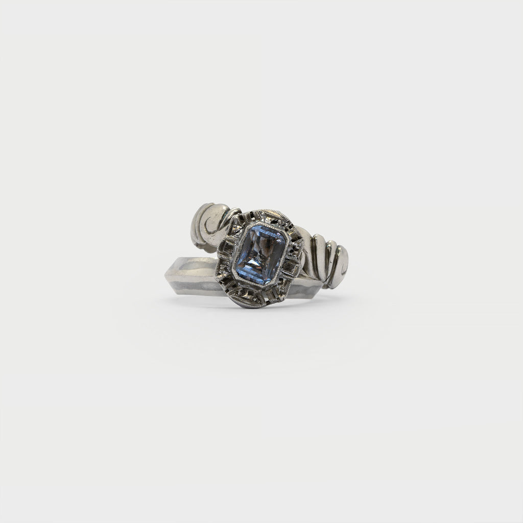 Two found rings and a single earring.