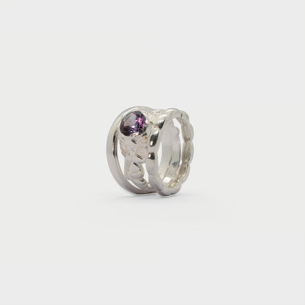 Two found rings and a solitaire mermaid ring