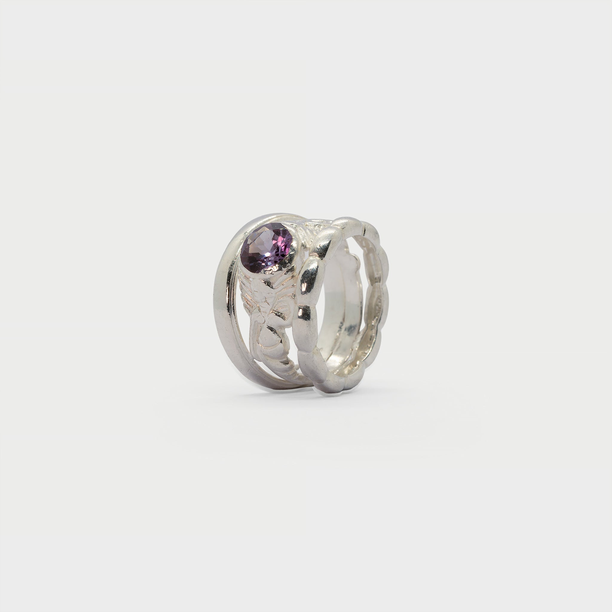 Two found rings and a solitaire mermaid ring