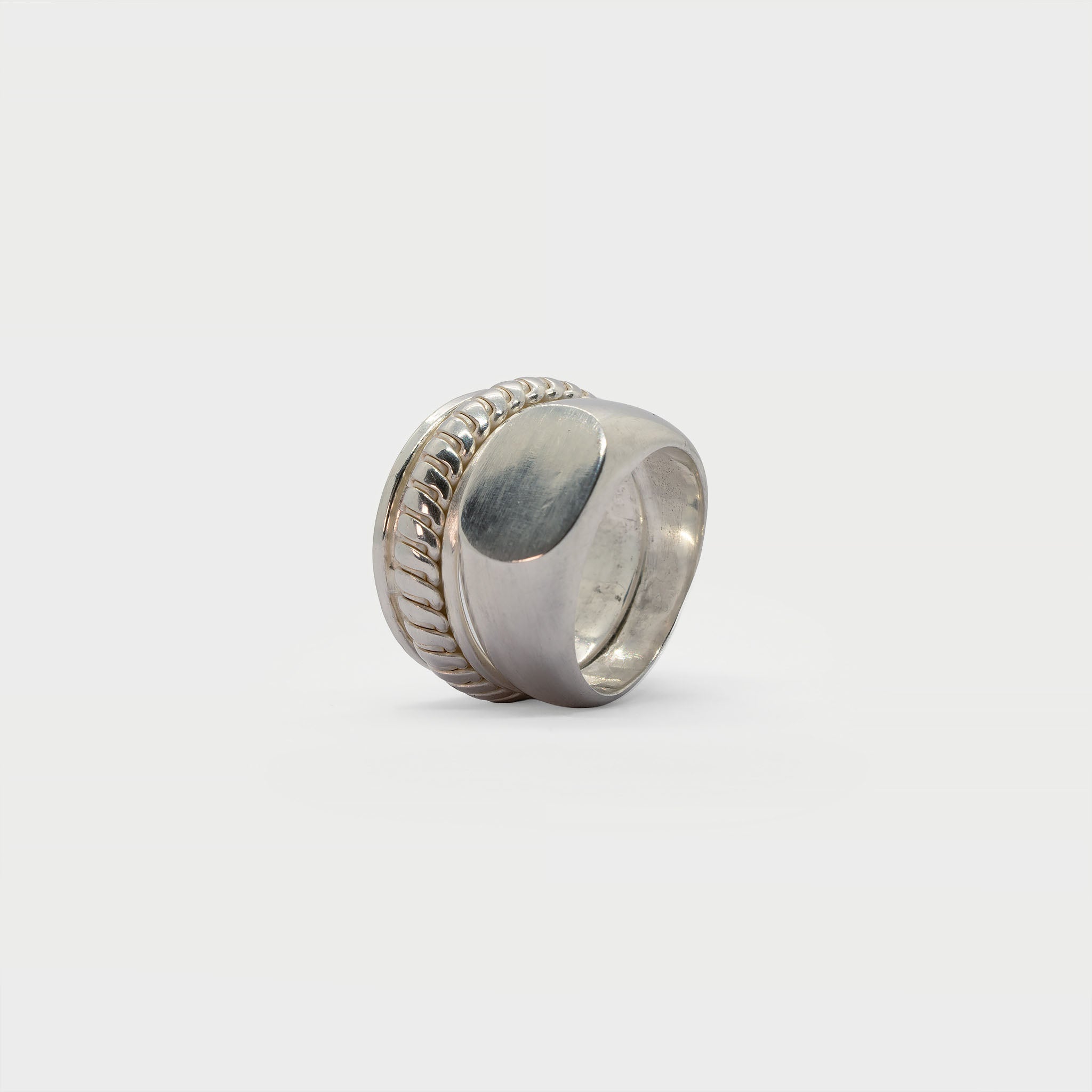 Signet ring and two overlaped ring bands.
