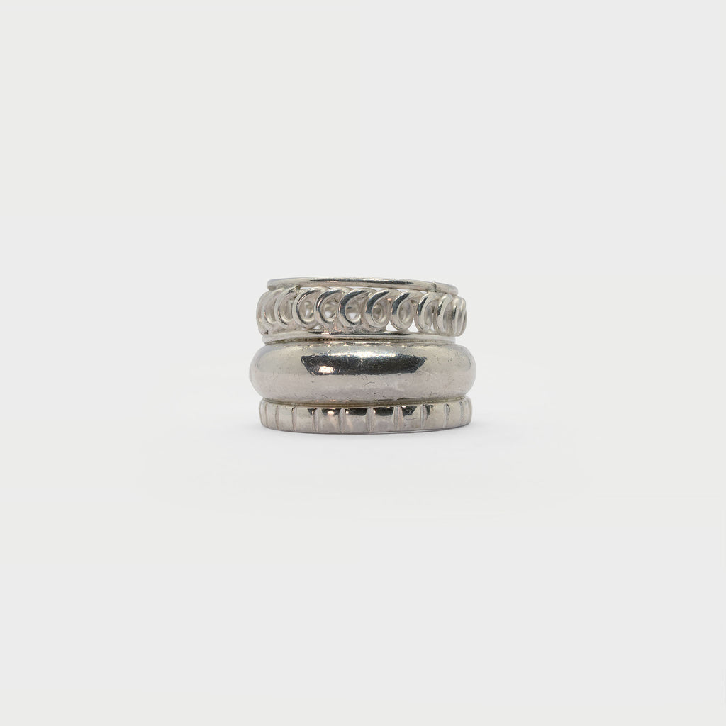 Three found textured rings.