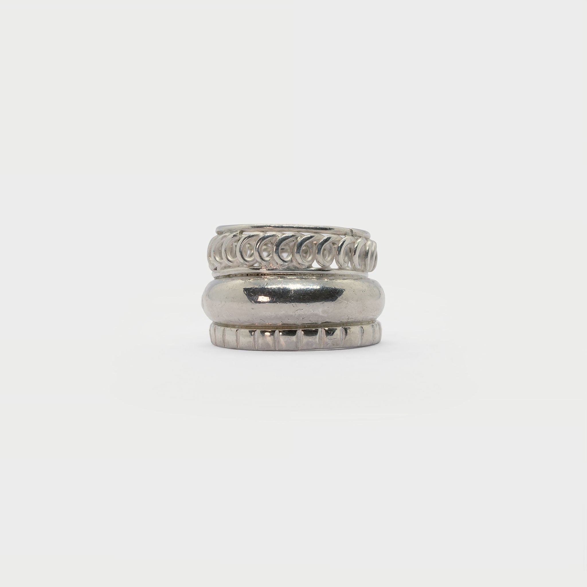 Three found textured rings.