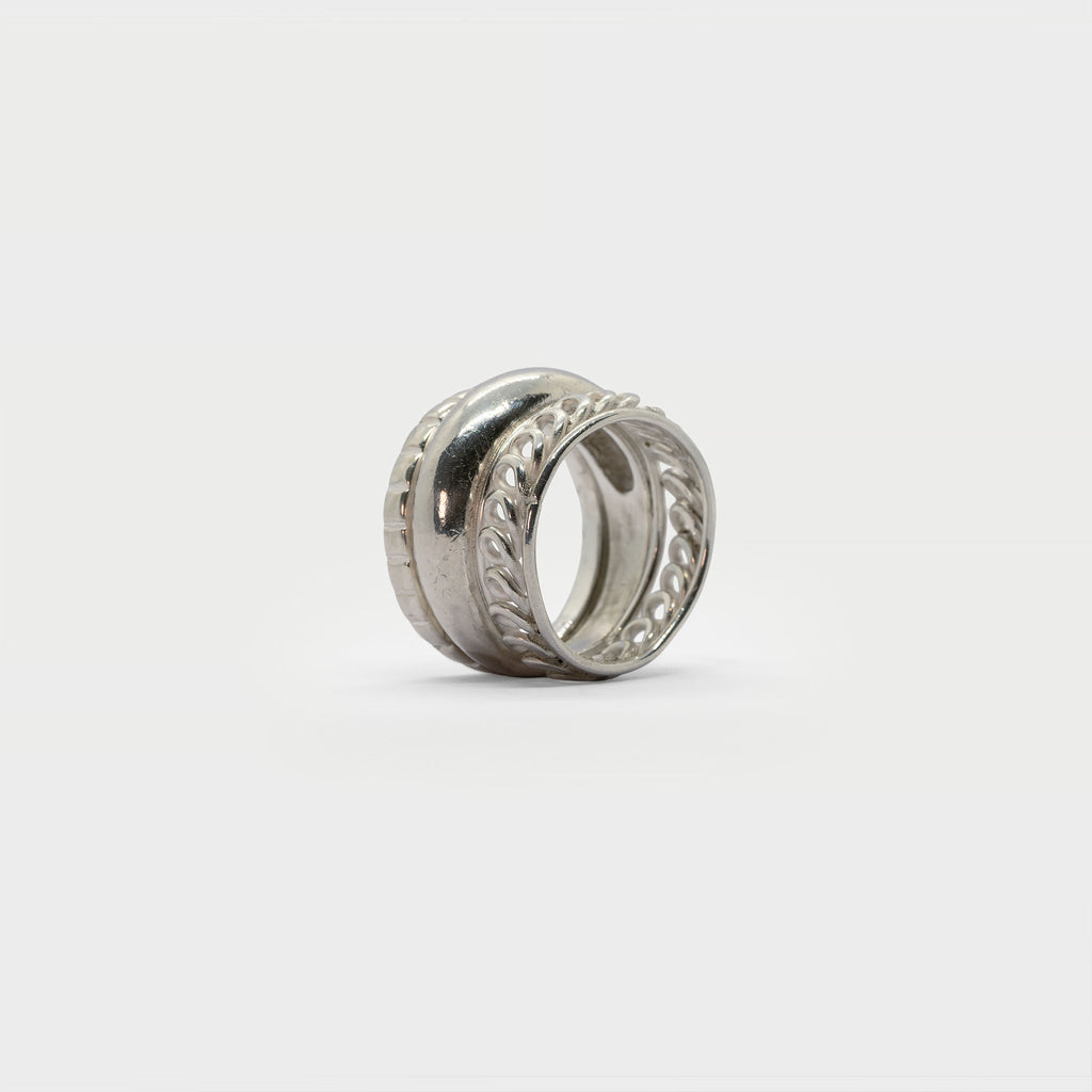 Three found textured rings.