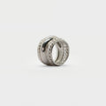 Three found textured rings.