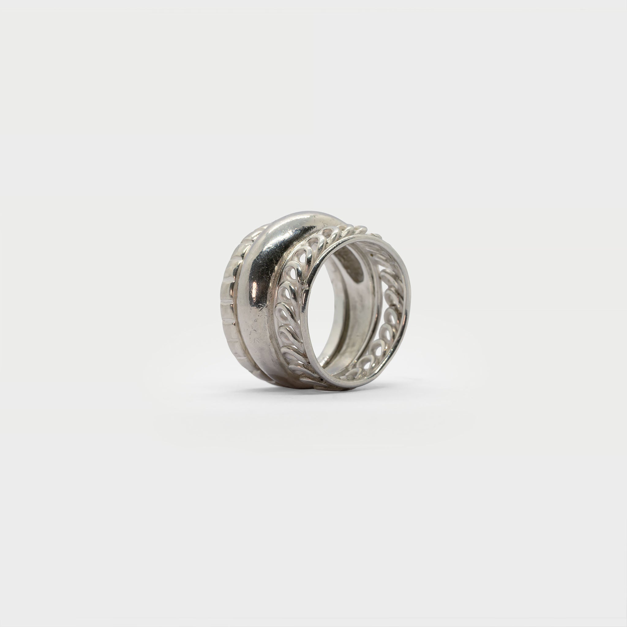Three found textured rings.