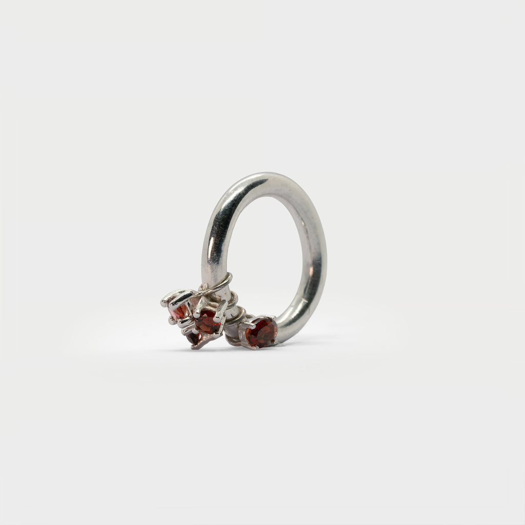 Sterling silver ring band with 4 found prong settings.