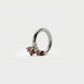 Sterling silver ring band with 4 found prong settings.
