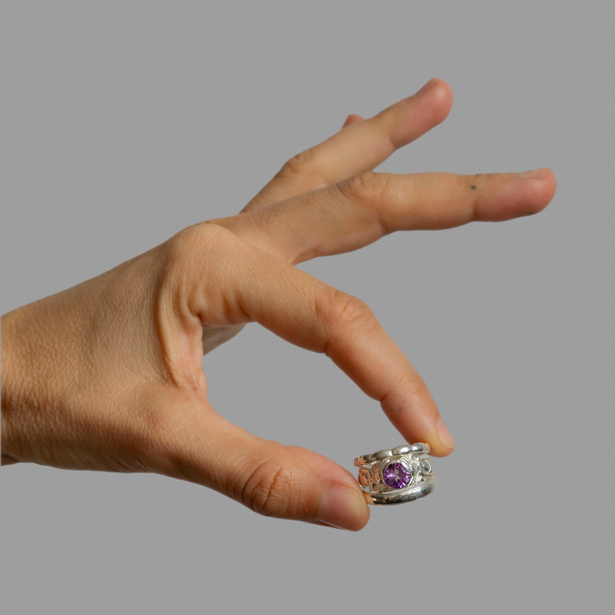 Two found rings and a solitaire mermaid ring