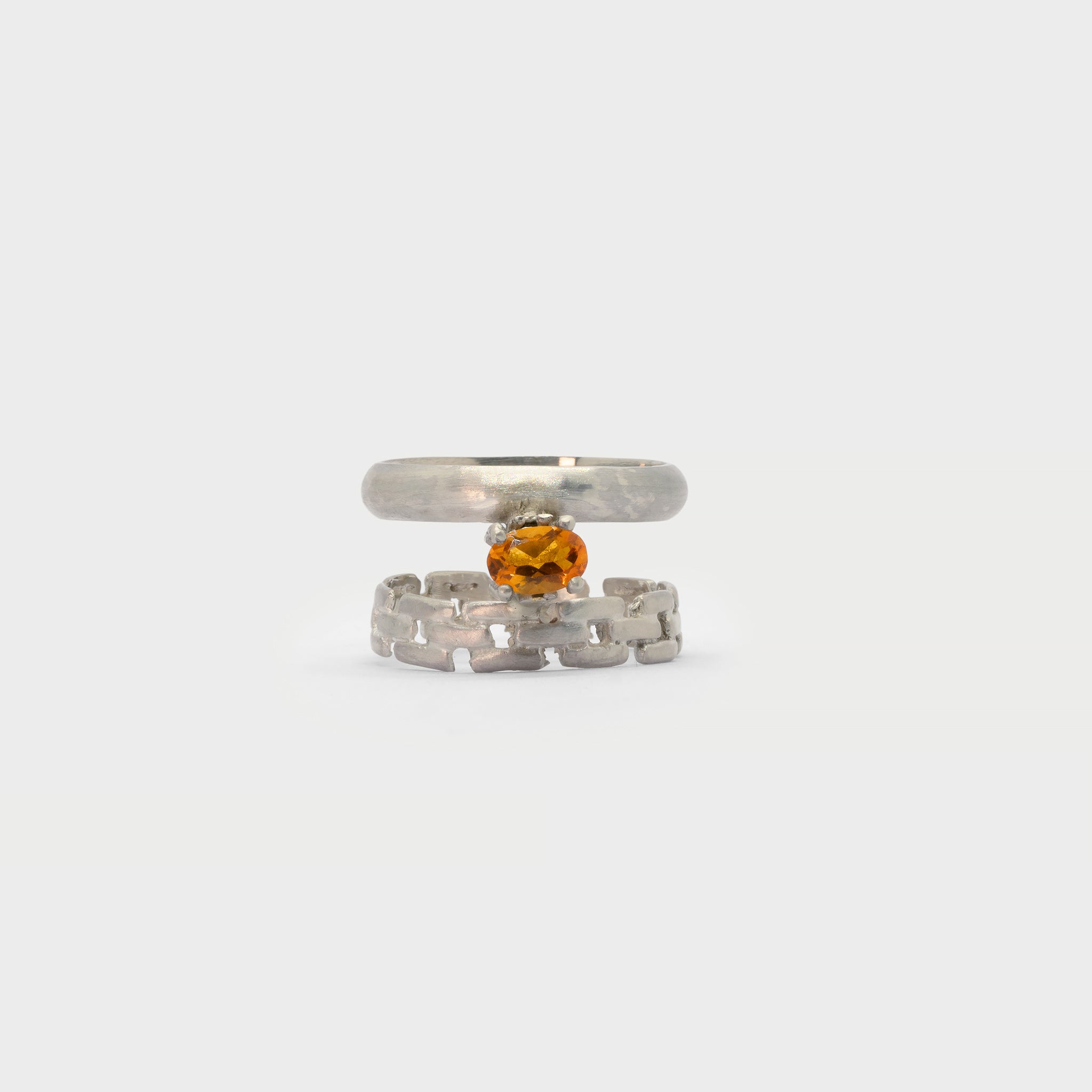 Two found rings and a prong setting