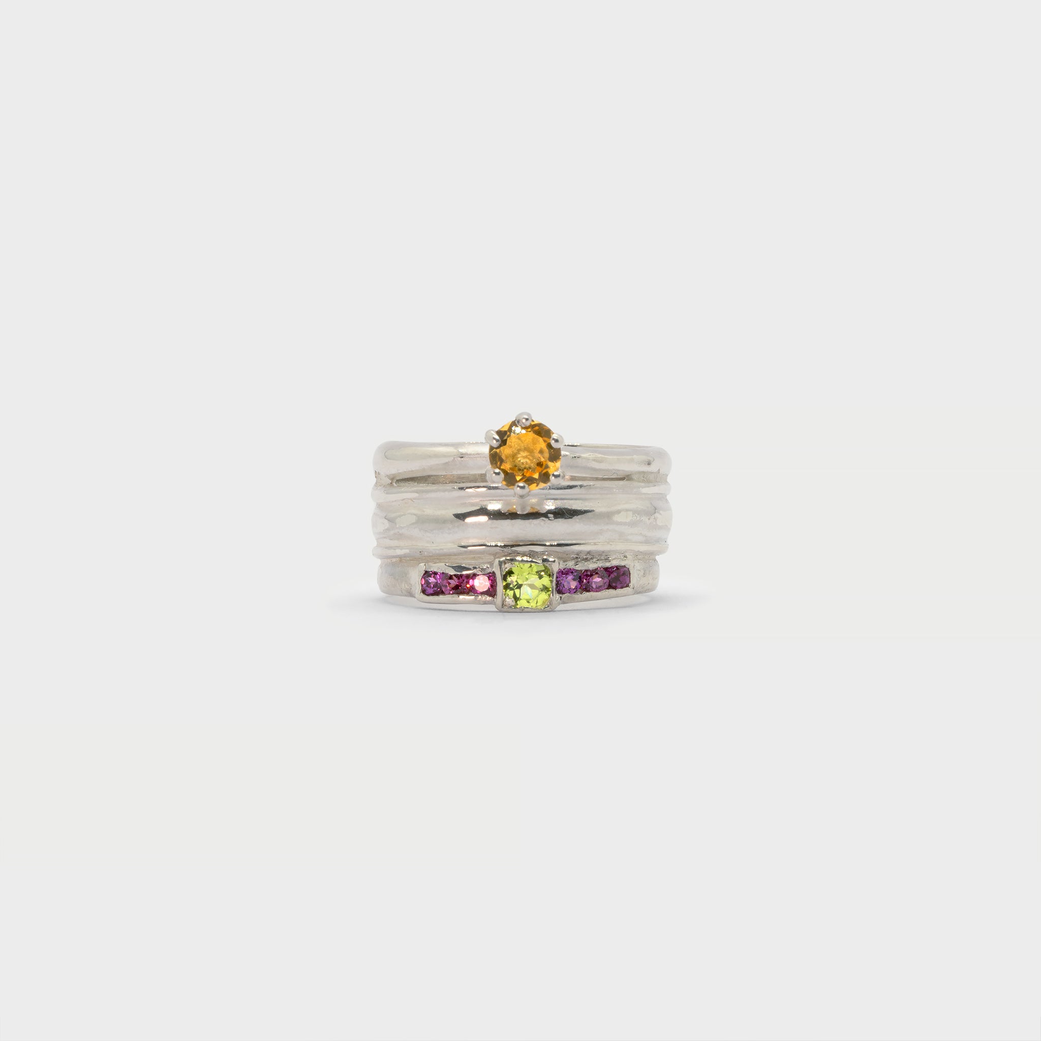 Found solitaire ring, ring band and a side-stone solitaire ring