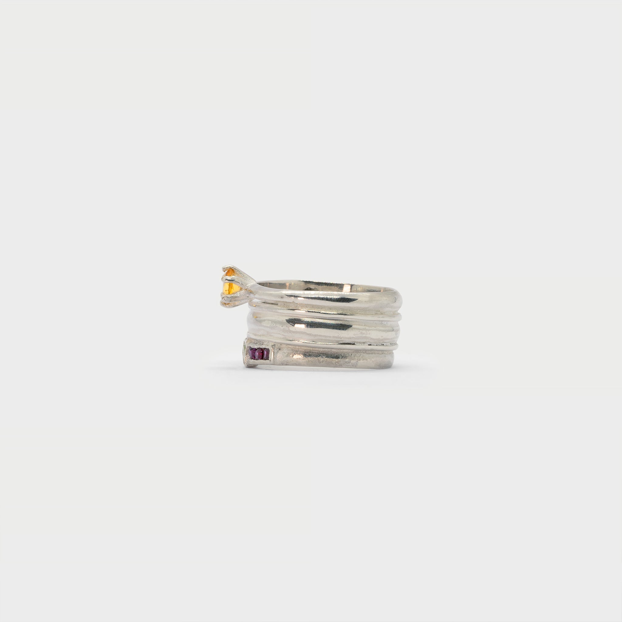 Found solitaire ring, ring band and a side-stone solitaire ring