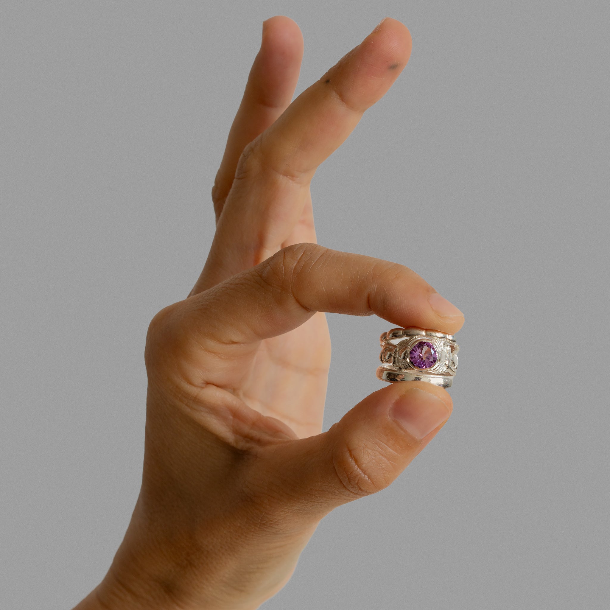 Two found rings and a solitaire mermaid ring
