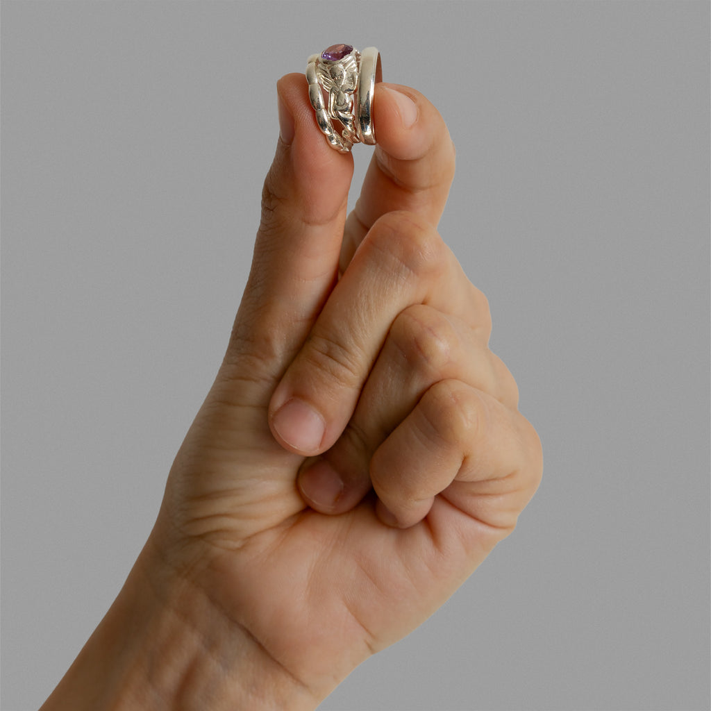 Two found rings and a solitaire mermaid ring