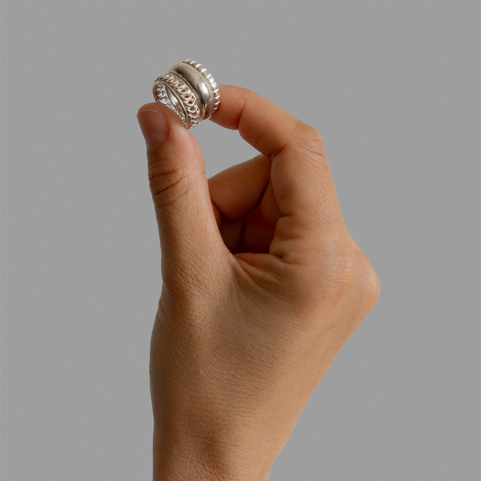 Three found textured rings.