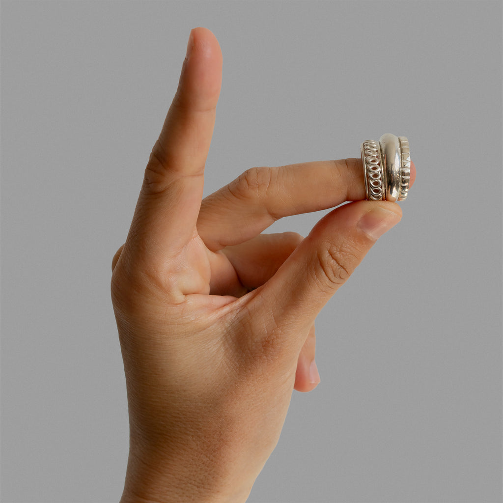 Three found textured rings.