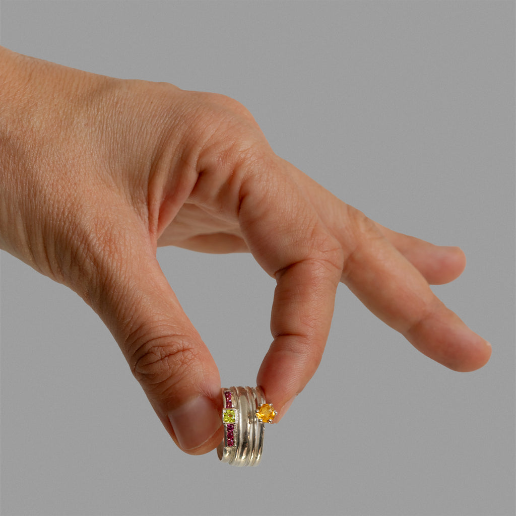Found solitaire ring, ring band and a side-stone solitaire ring