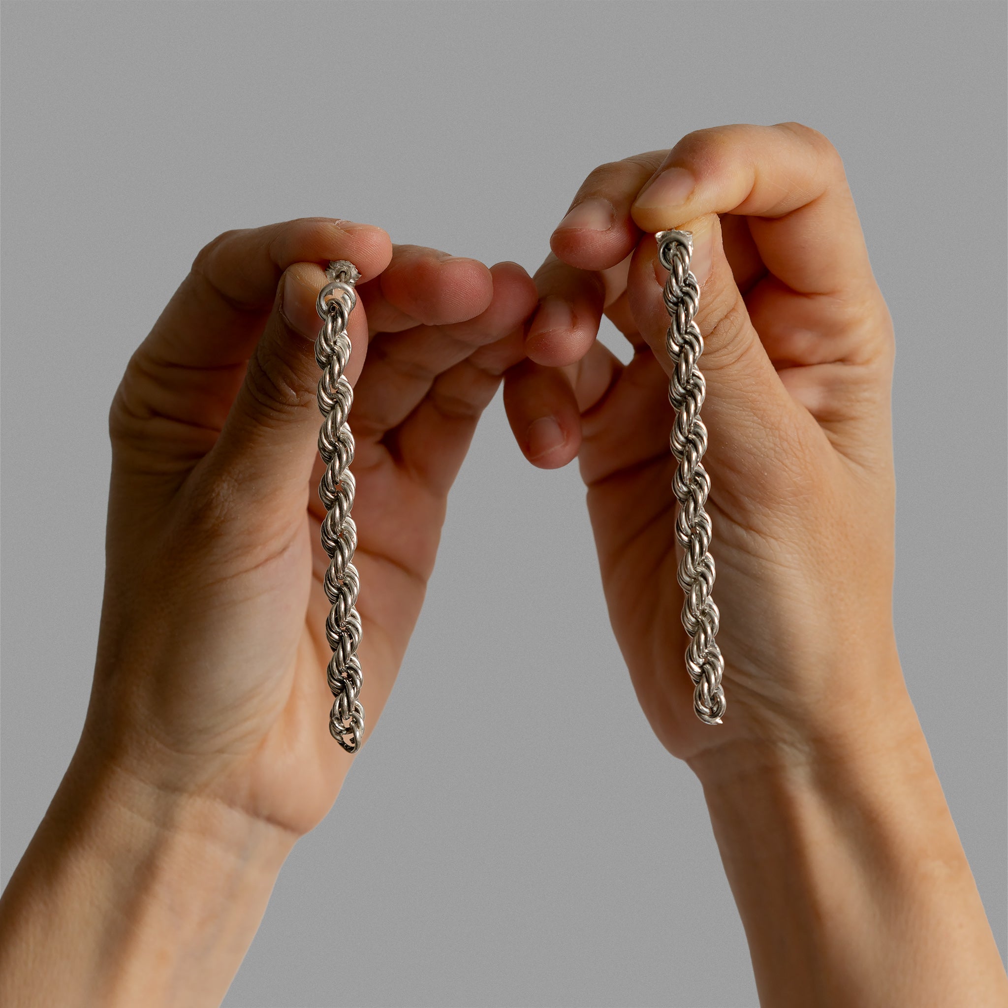 Long rope chain earring.
