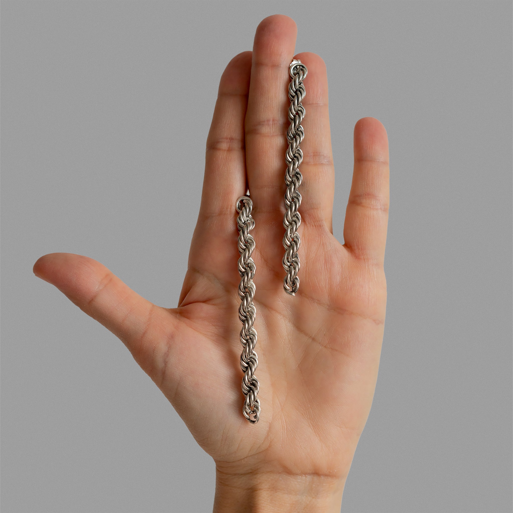 Long rope chain earring.