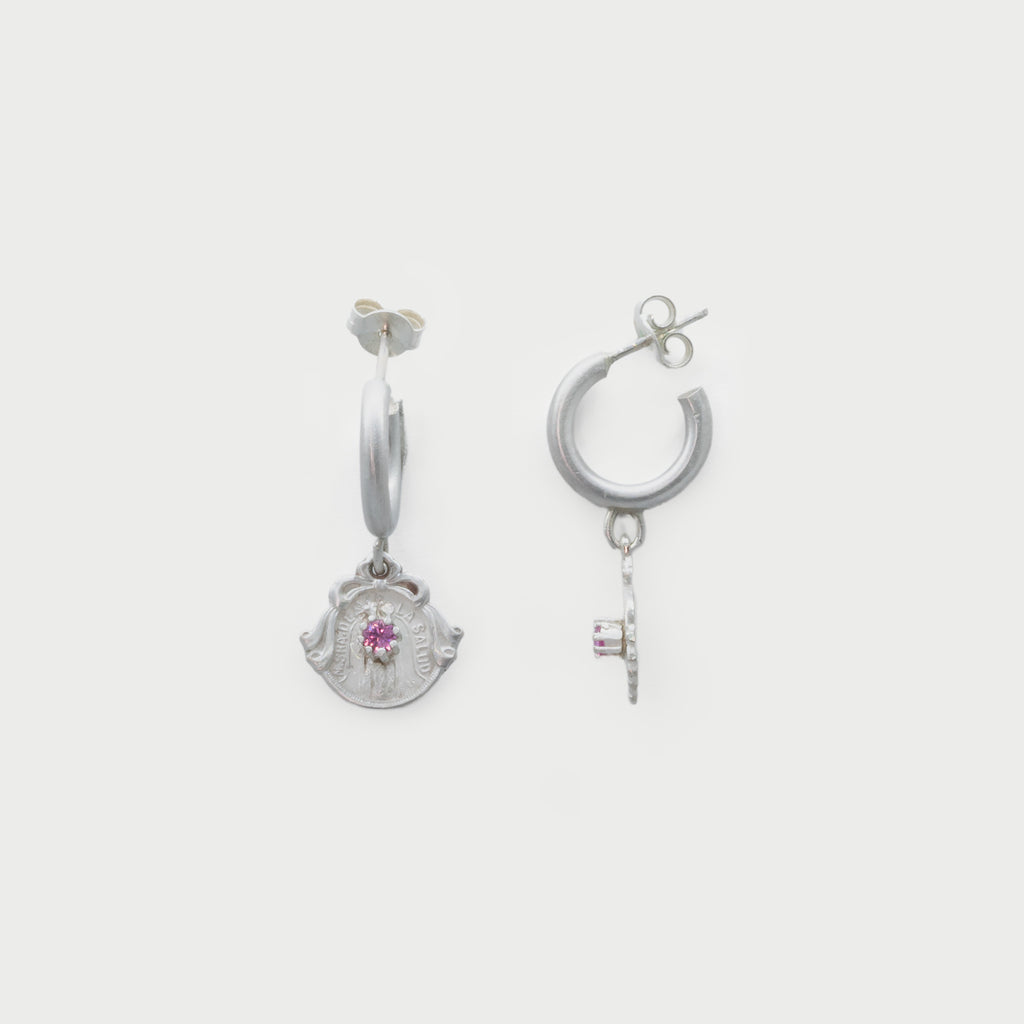 Hoop with medals and pink saphire.