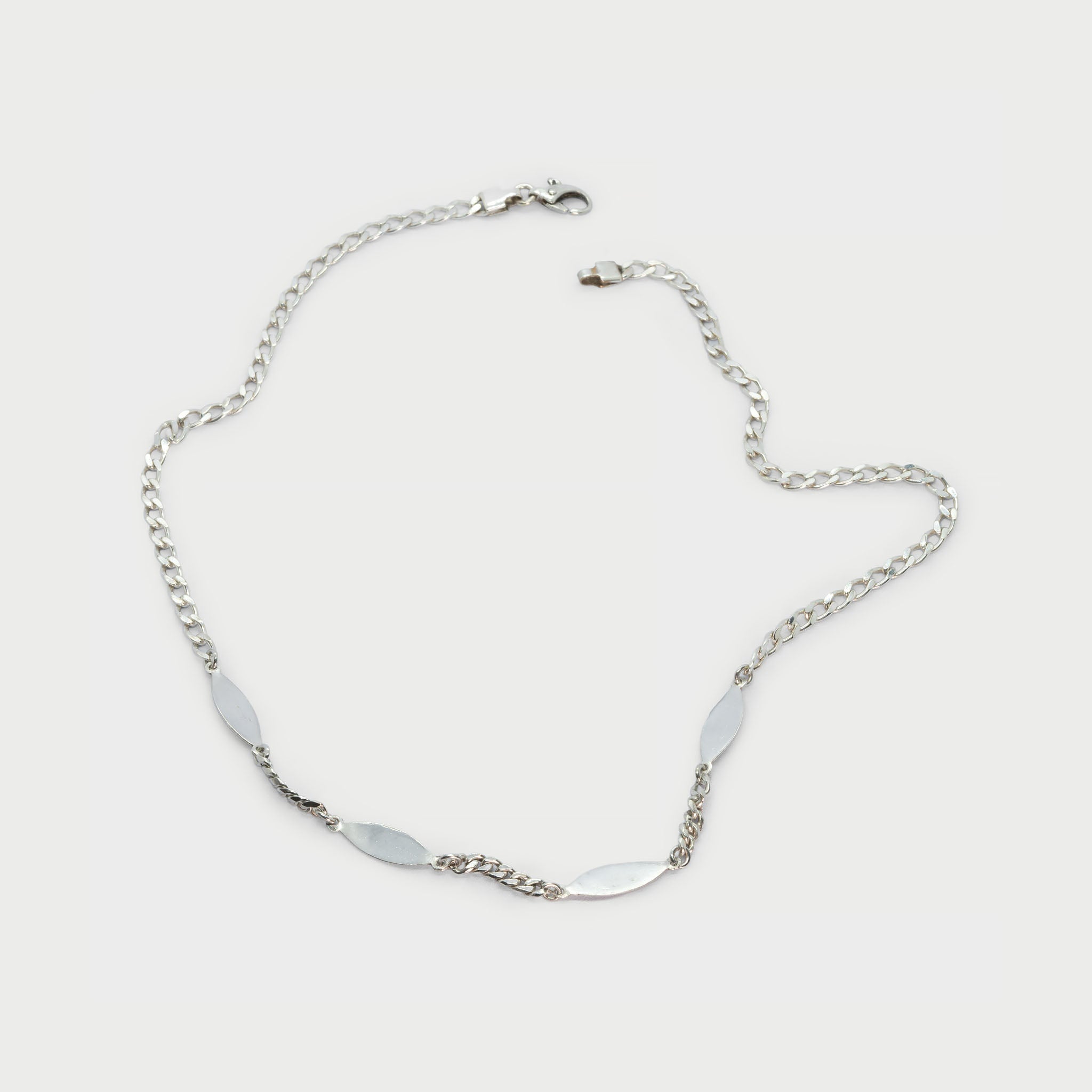 Necklace made of 'No me olvides' bracelets.