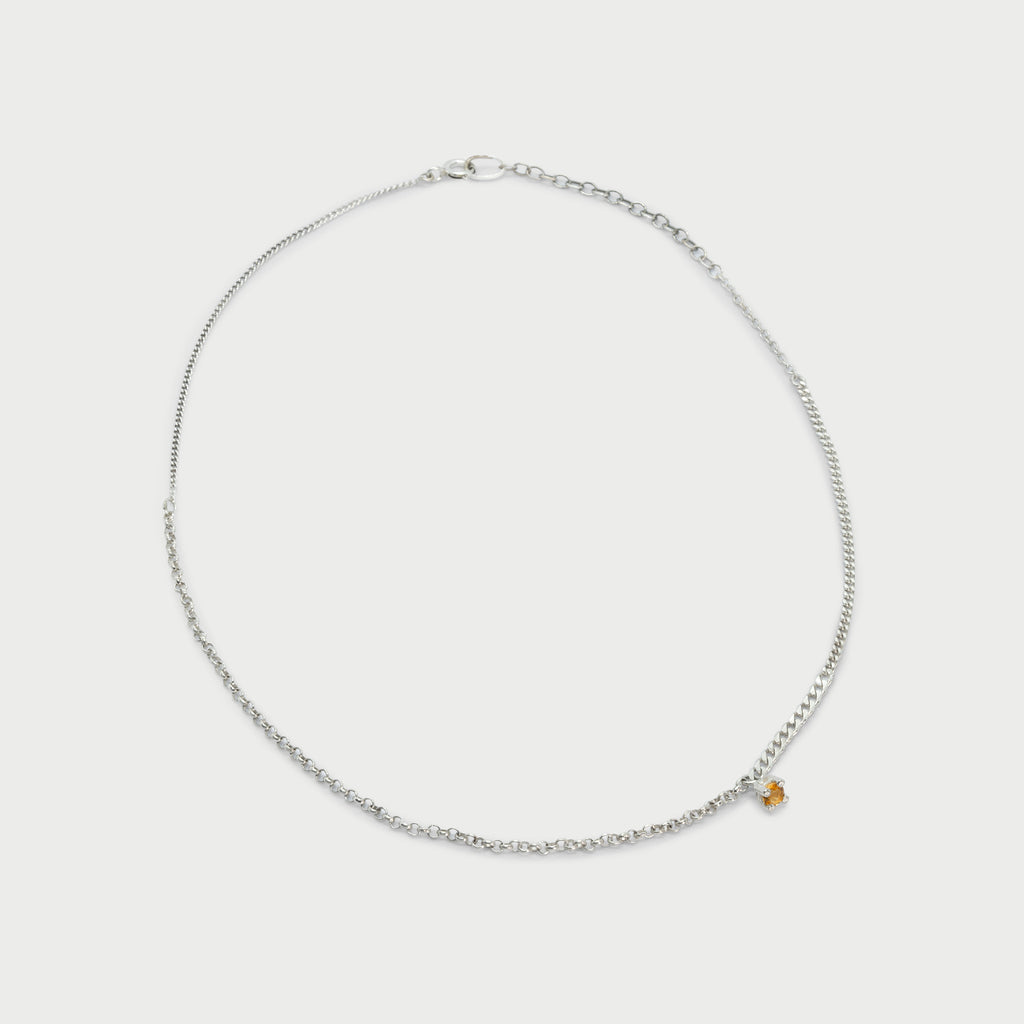 Broken chain pieces with 4 prong setting and citrine.