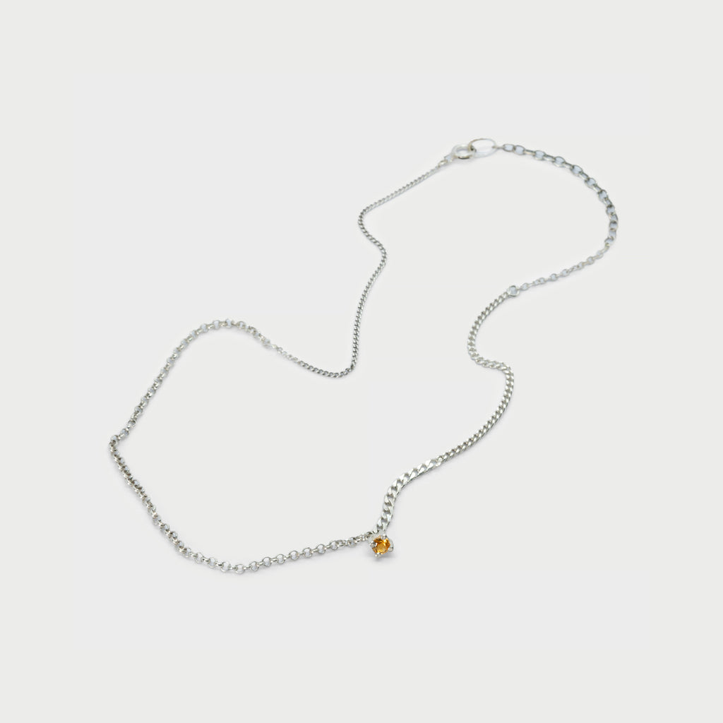 Broken chain pieces with 4 prong setting and citrine.