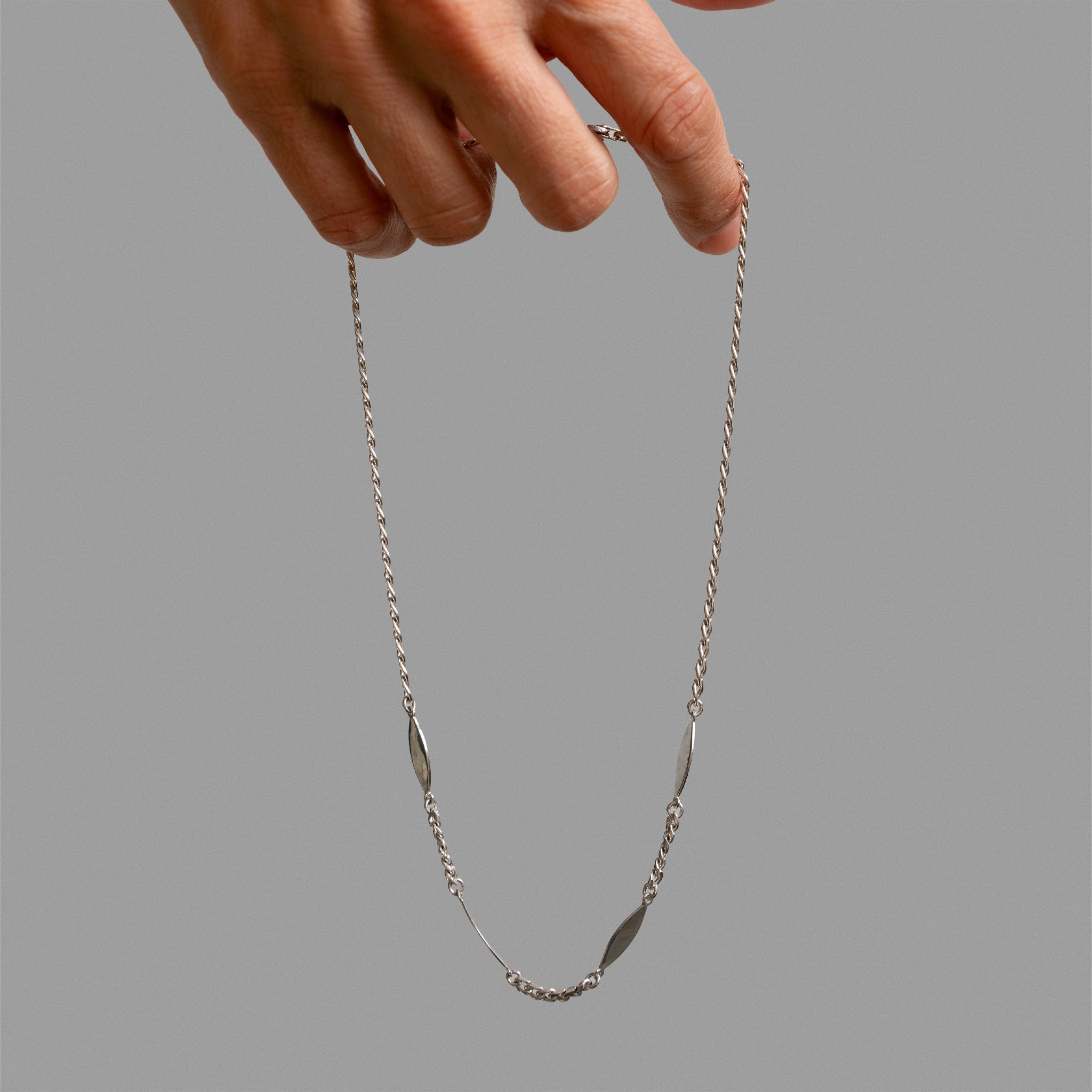 Necklace made of 'No me olvides' bracelets.