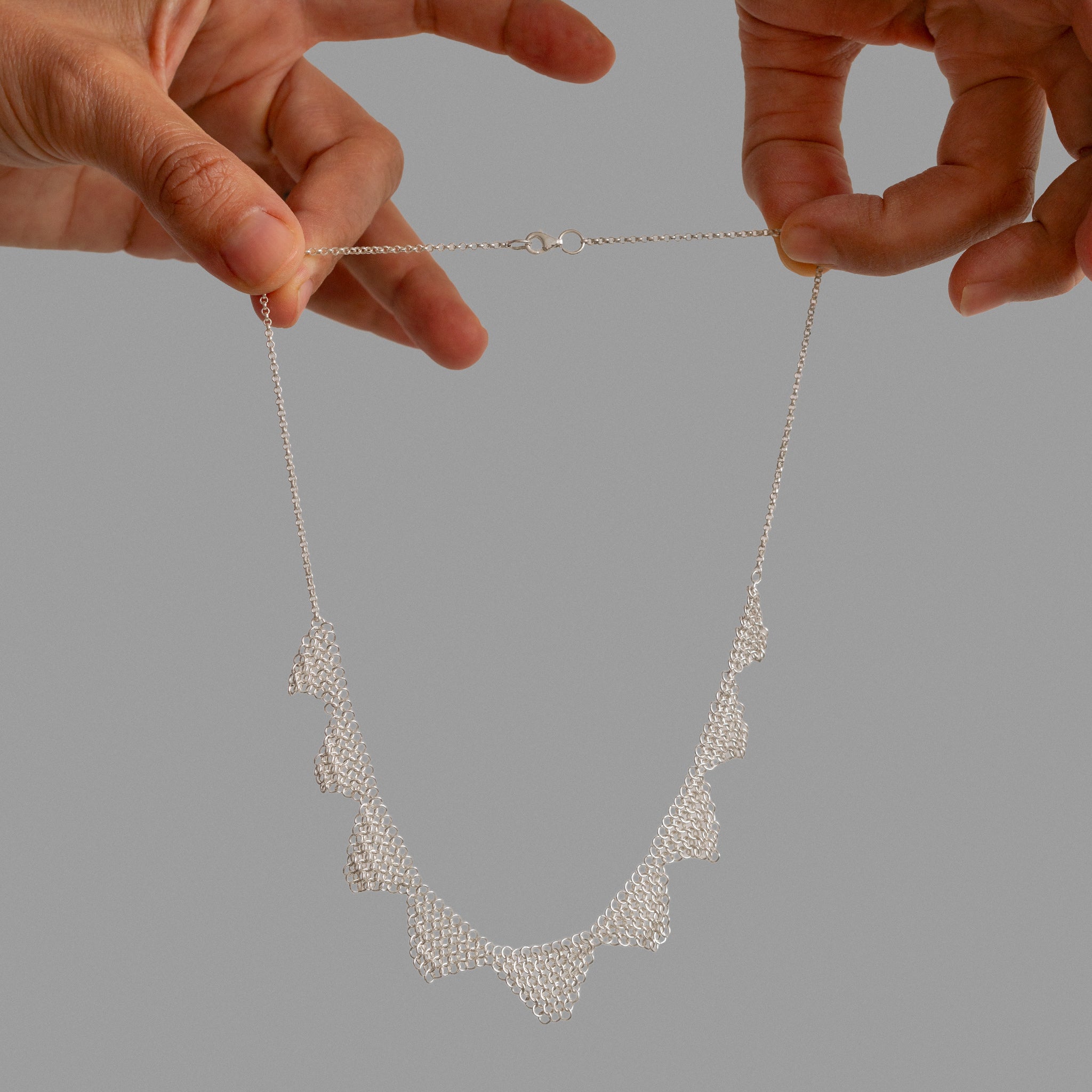 Sterling silver mesh necklace.