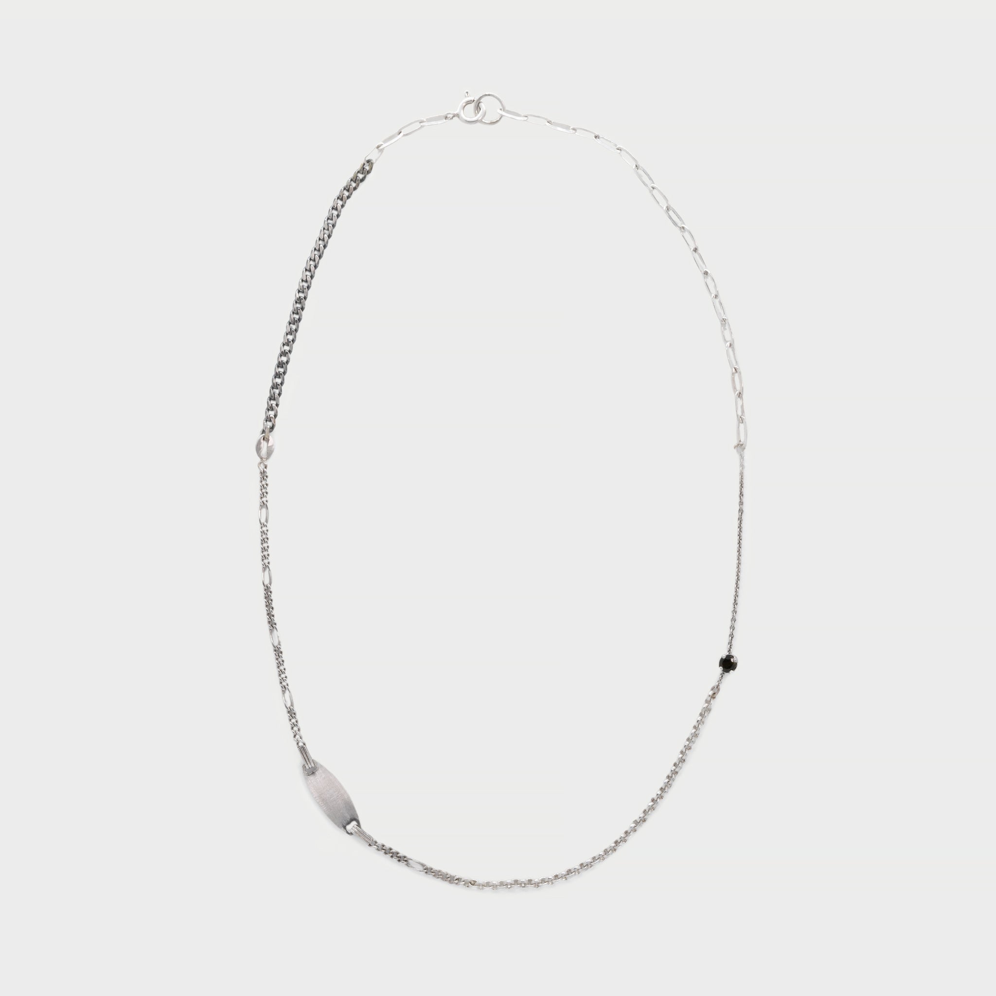 Necklace made of broken chain pieces and 'no me olvides' bracelet.