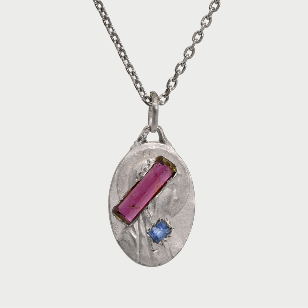 Found silver medal with stones