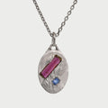 Found silver medal with stones
