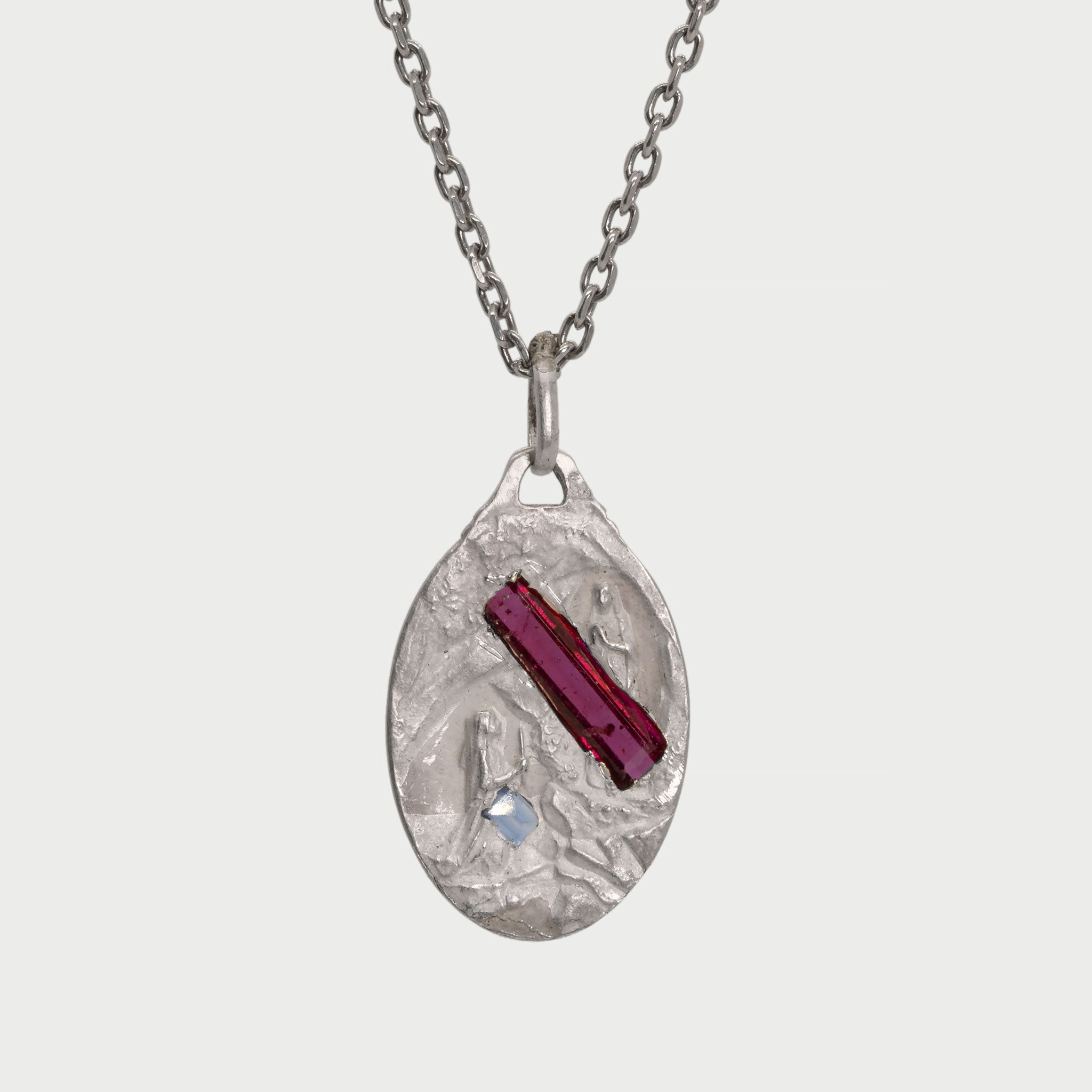 Found silver medal with stones