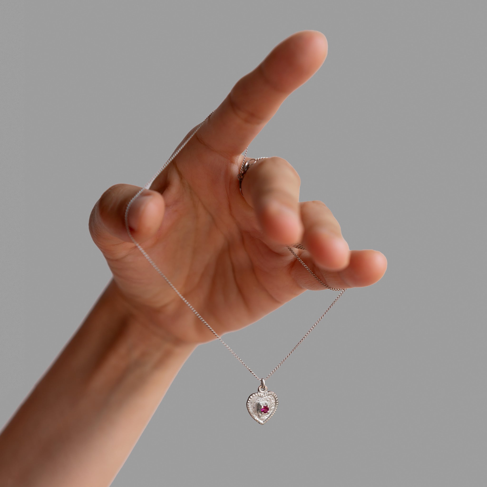Heart medal and 4 prong setting