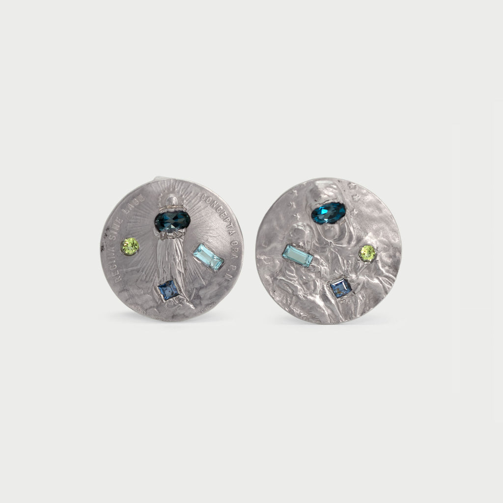 Two found medals with stones